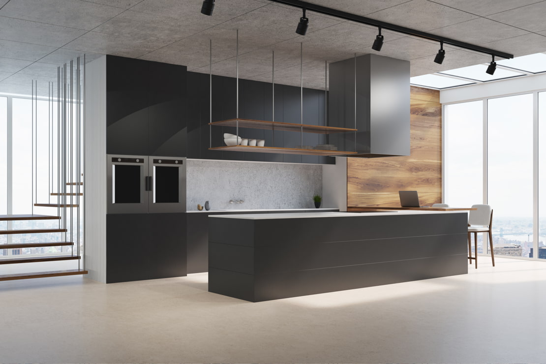 Microcement in a luxury kitchen with large spaces and a large island